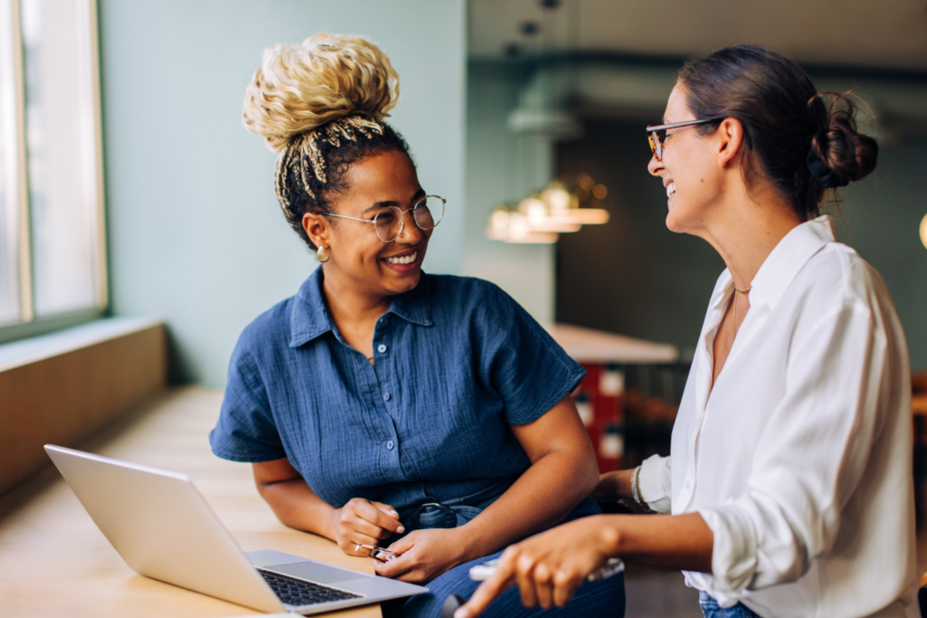 business women working together at their laptop