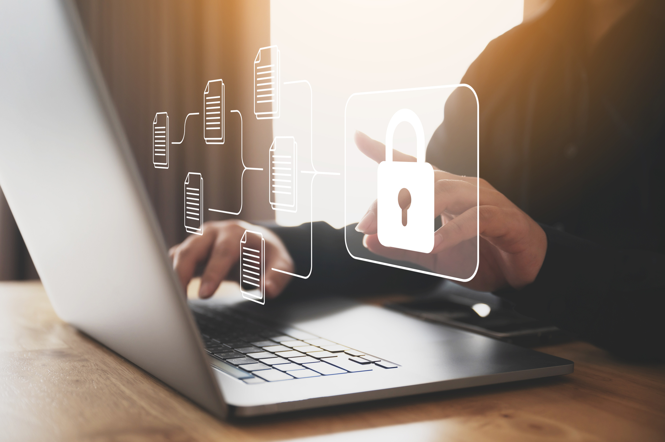 man on laptop with lock